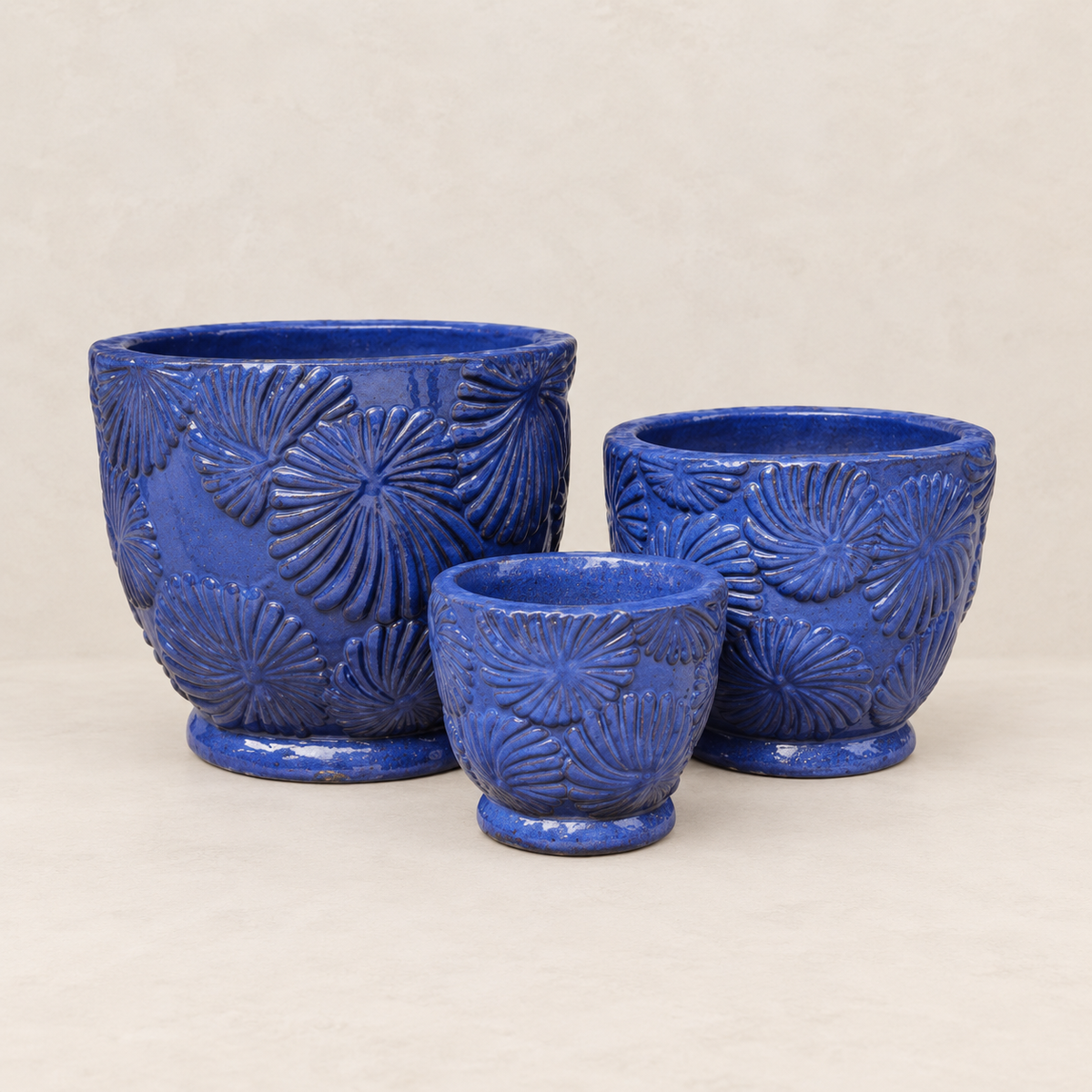 Set de 4 campanas de cerámica artesanal en azul océano, tamaños variados