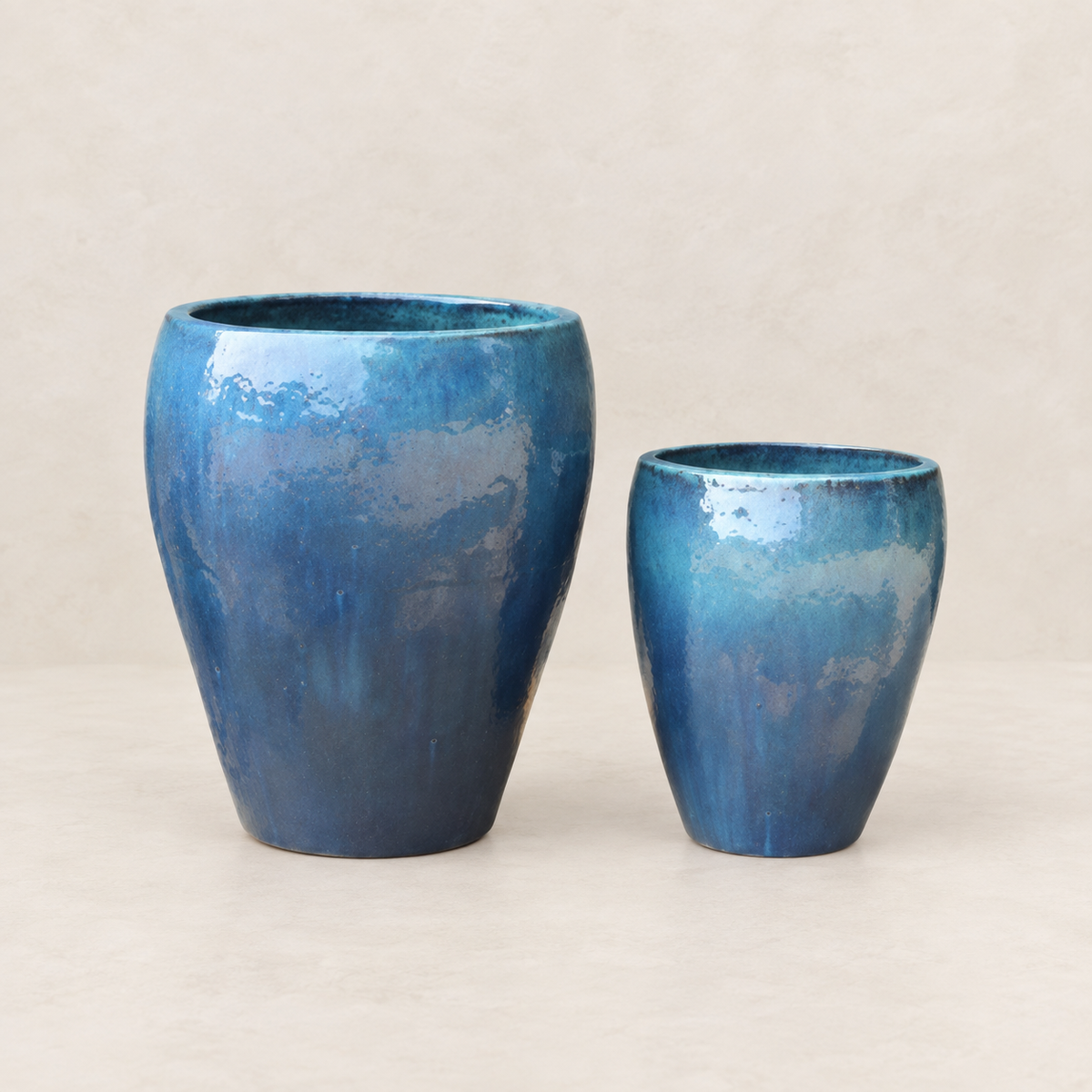 Set de 2 tinajas redondas esmaltadas azul océano con acabado brillante artesanal